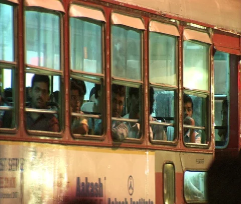 MS bus full of passengers passes camera. Stock Footage 86742309