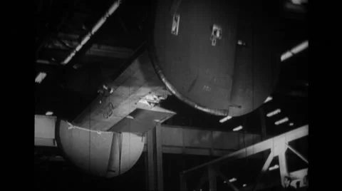 MS derrick lifting tail section of B-24 Liberator Stock Footage