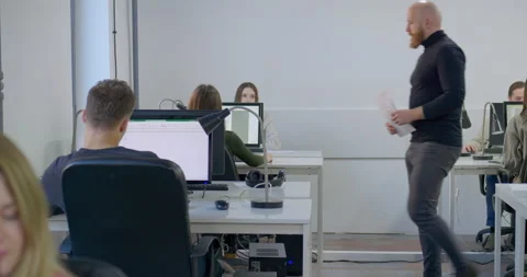 MS DS Office workers using computers and walking around office Stock Footage 145203036