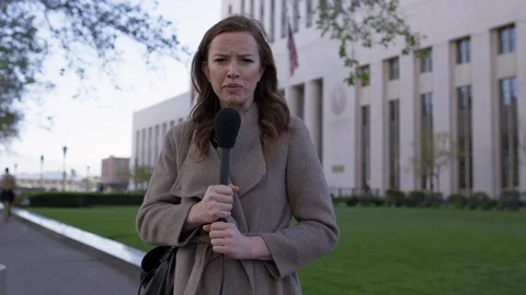 MS Female journalist in front of old Federal Court in Downtown LA 4K Stock Footage 89109537