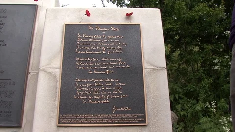 MS "In Flanders Fields" Poem Plaque and Monument in Essex Farm Cemetery Stock-Footage 97792592