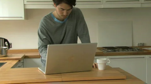 MS OF A MAN USING A LAPTOP Stock Footage 542895