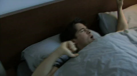 MS OF A MAN WAKING UP Stock Footage 542174
