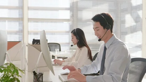 MS Office workers with headsets Stock Footage 108851373