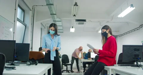 MS Office workers wearing protective face mask Stock Footage 145148367