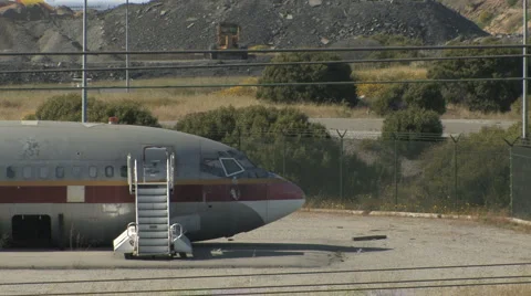MS Old Airplane in a Plane Graveyard 1 Stock Footage 4280214