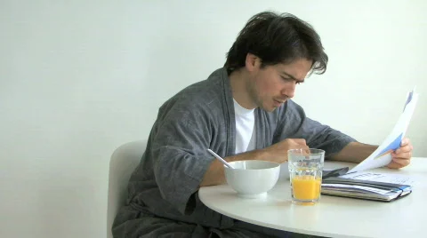 MS PAN OF A MAN SORTING OUT PAPERWORK Stock Footage 543105