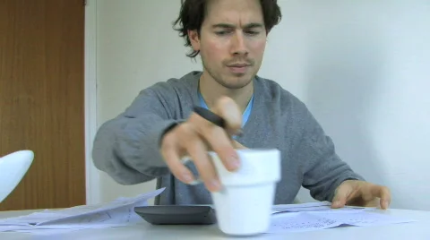 MS PAN OF A MAN SORTING OUT FINANCES 스톡 동영상 543546