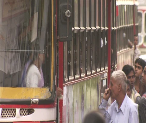 MS passengers getting off, then on Mumbai bus. Stock Footage 86742762