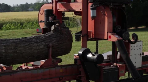 MS Portable sawmill cutting log side shot Stock Footage 40472225