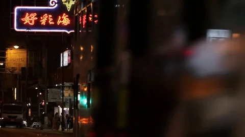 MS SELECTIVE FOCUS Trolley tram driving on street at night / Hong Kong, China Stock Footage 69930260