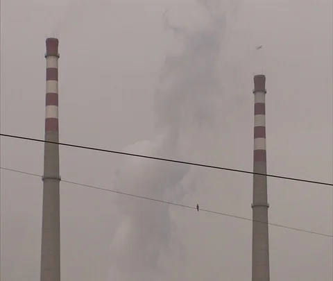 MS smoke plume rising between two chimneys at Shenhua Sanhe power plant Video stock 86745295