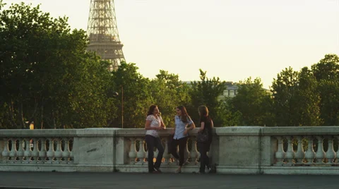 MS Three young women talking on bridge / Paris, France Stock Footage 38829894
