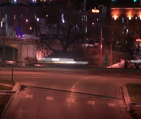 MS traffic passing through Denver at night with streaky light effect. Stock Footage 86748069