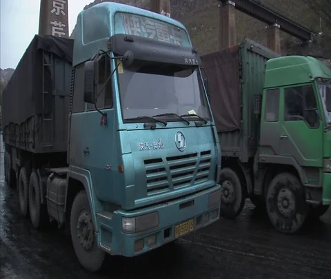 MS trucks carrying coal pull out Stock Footage 86744838