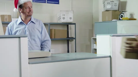 MS TU Elderly man mailing parcel at post office / Orem, Utah, USA Stock Footage 38833621