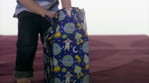 MS TU TD Boy (4-5) opening birthday gift Video stock 11339558