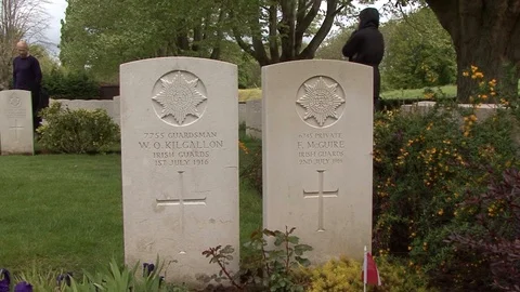 MS Two Irish Guards Gravestones at Essex Farm Cemetery in Belgium Stock Footage 97792676
