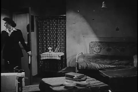 Ms. Williams prepares to operate transmitter from different place - 1943 Stock Footage 105752718