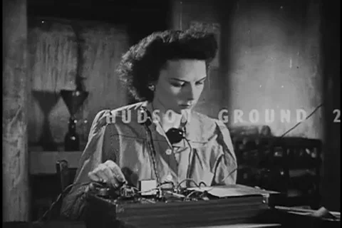 Ms. Williams sends code messages about landing details through BBC news - 1943 Stock Footage 105753423