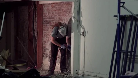 MS worker using a drill on the wall Stock Footage 81093514