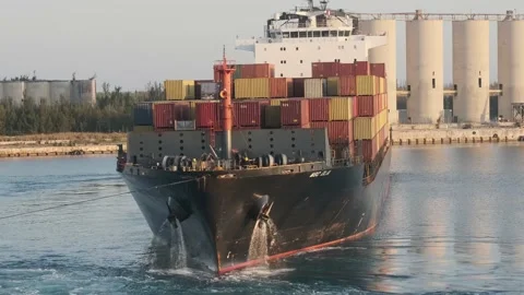 MSC container ship navigating out of port of Freeport Stock Footage 154878988