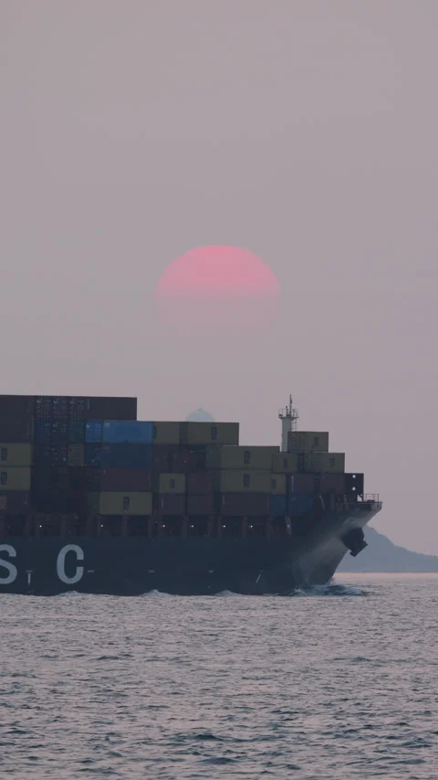 MSC container ship sailing at sunset at Urmston Road waterway Stock Footage 304653552