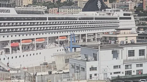 MSC Opera passengers queue to go ashore in Genoa Video stock 342575198