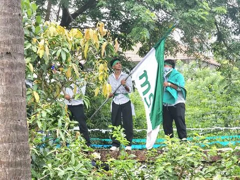 Msf students waving flags Stock Photos