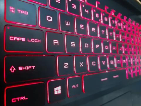 MSI red color laptop keyboard Stock Photos