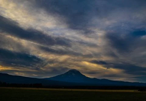 Mt Adams S SE Side at Sunset Silhouette Clouds Stock Photos