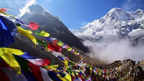 Mt. Annapurna I (8,091m) with prayer flag from Annapurna base camp, Nepal. Stock Footage