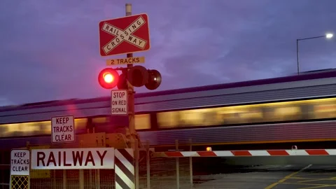 Mt Atkinson Australia-railroad level crossing of VLine with a train passing by Vídeos de archivo 246540290