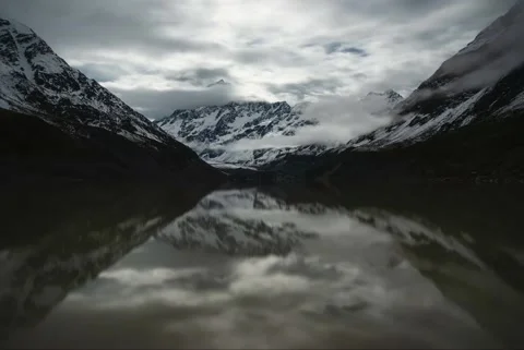 Mt. Cook in clouds under moonlight at Hooker Lake, New Zealand. Aoraki Stock Footage 132299691