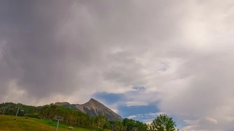 Mt. Crested Butte Ski Resort with Incoming Storm Time Lapse, Timelapse, Time- Stock Footage 128945441
