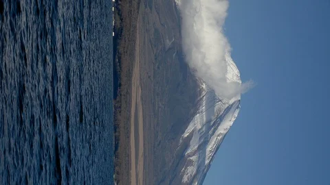 Mt. Fuji and clouds in winter, Lake Yamanakako, Yamanashi, Japan Stock Footage 101671392