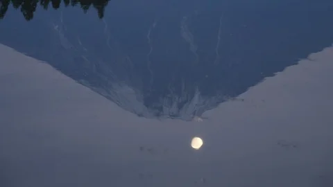 Mt. Fuji and the Moon Reflected in Water (Zoom In) Stock Footage 128282705