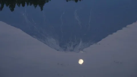 Mt. Fuji and the Moon Reflected in Water Stock Footage 128314377