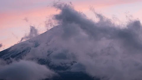 Mt. Fuji Emerging from Clouds at Sunset (time lapse/zoom in) Stock Footage 114357447