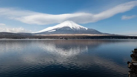 Mt. Fuji with a Huge Lenticular Cloud Reflected in Lake Yamanaka (time lapse) Stock Footage 124103596