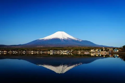 Mt. Fuji with skyline reflection Stock Photos
