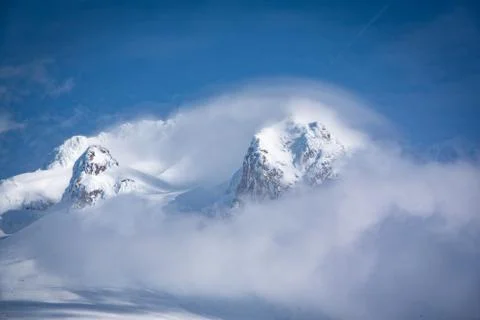 Mt Hood peaking through clouds Stock Photos