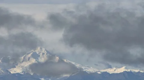 Mt Illiamna Shrouded by Clouds Stock Footage 8685849