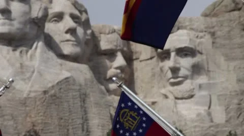 Mt. Rushmore - tight pan through flags 스톡 동영상 8838198