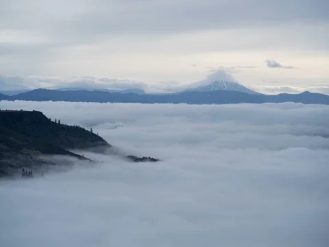 Mt. Shasta Time Lapse with Upper Table Rock fog forground Stock Footage 72803341