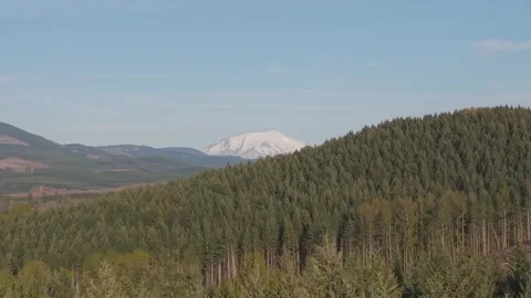 Mt St Helens revealed from behind foothills Stock Footage 307237222