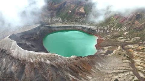 Mt. Zao Okama Crater | Emerald Green Lake - 4K Aerial Video Video stock 329051059