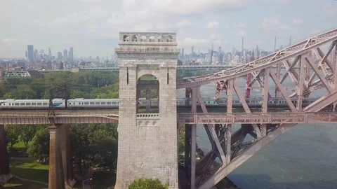 MTA train going over the Hell Gate Bridge in New York Stock Footage 165351117