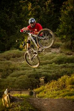 MTB jump in evening light Stock Photos