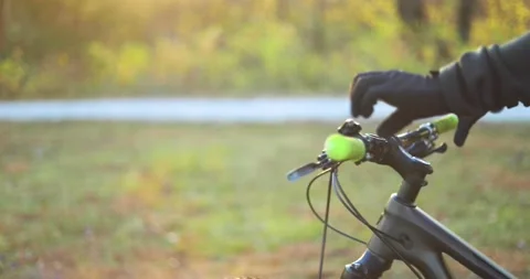 MTB PUTTING ON GLOVES Stock Footage 145864182